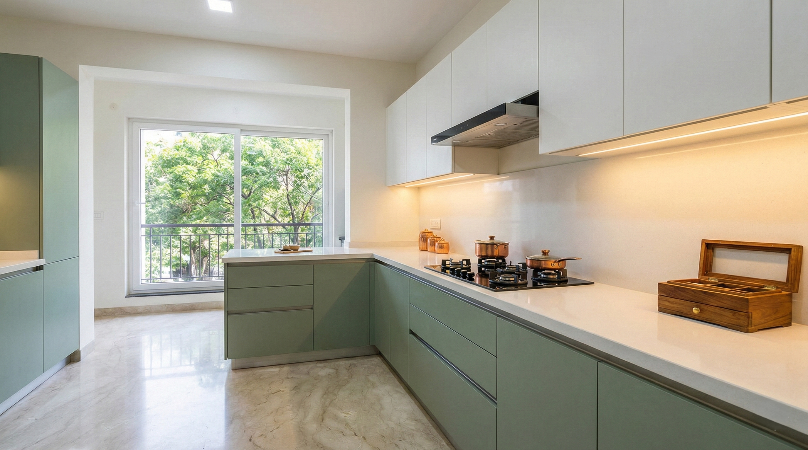 Sleek L-shaped kitchen with dark cabinets and integrated appliances.