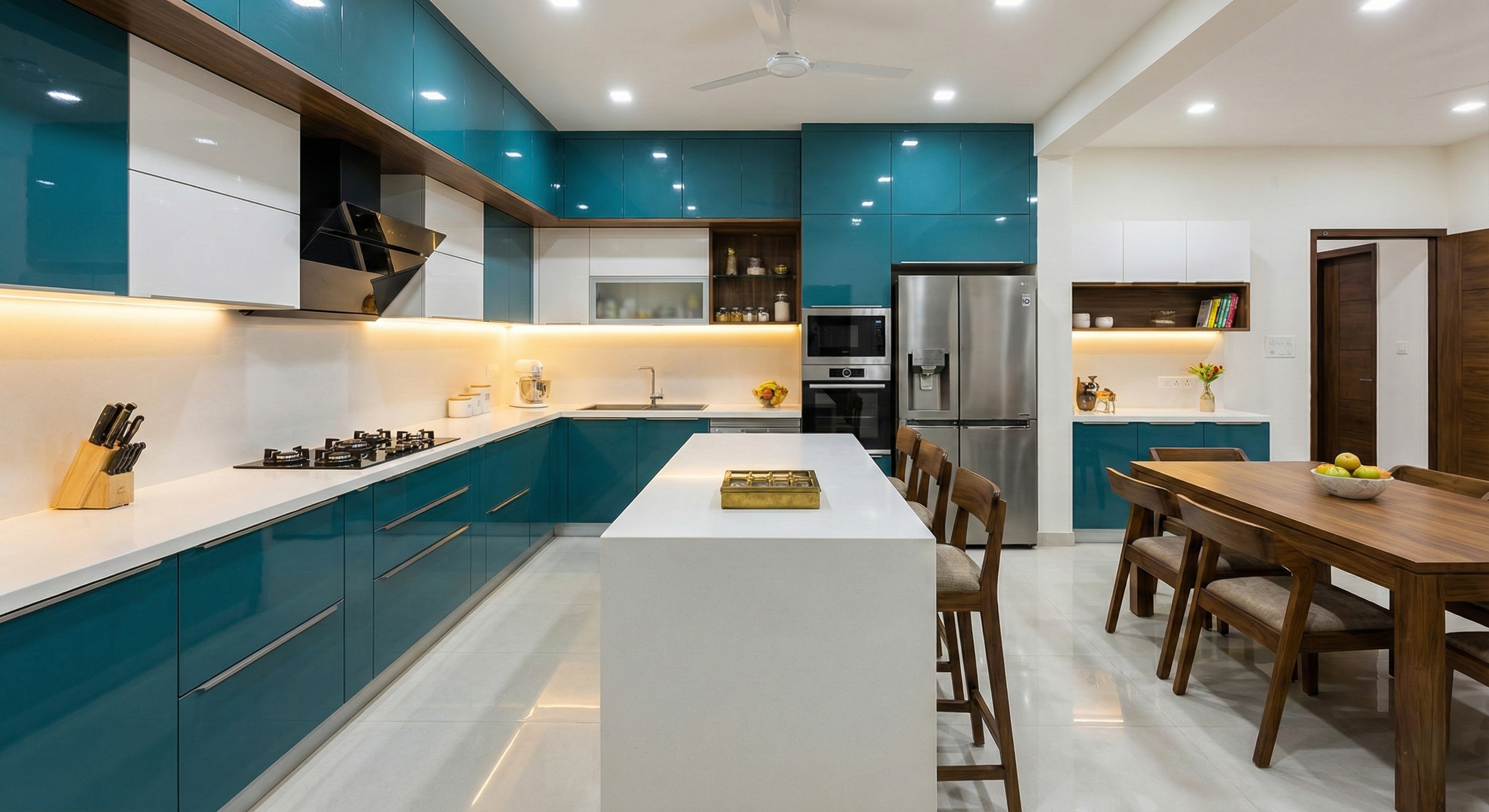 Modern L-shaped kitchen with wooden cabinets and white countertops.
