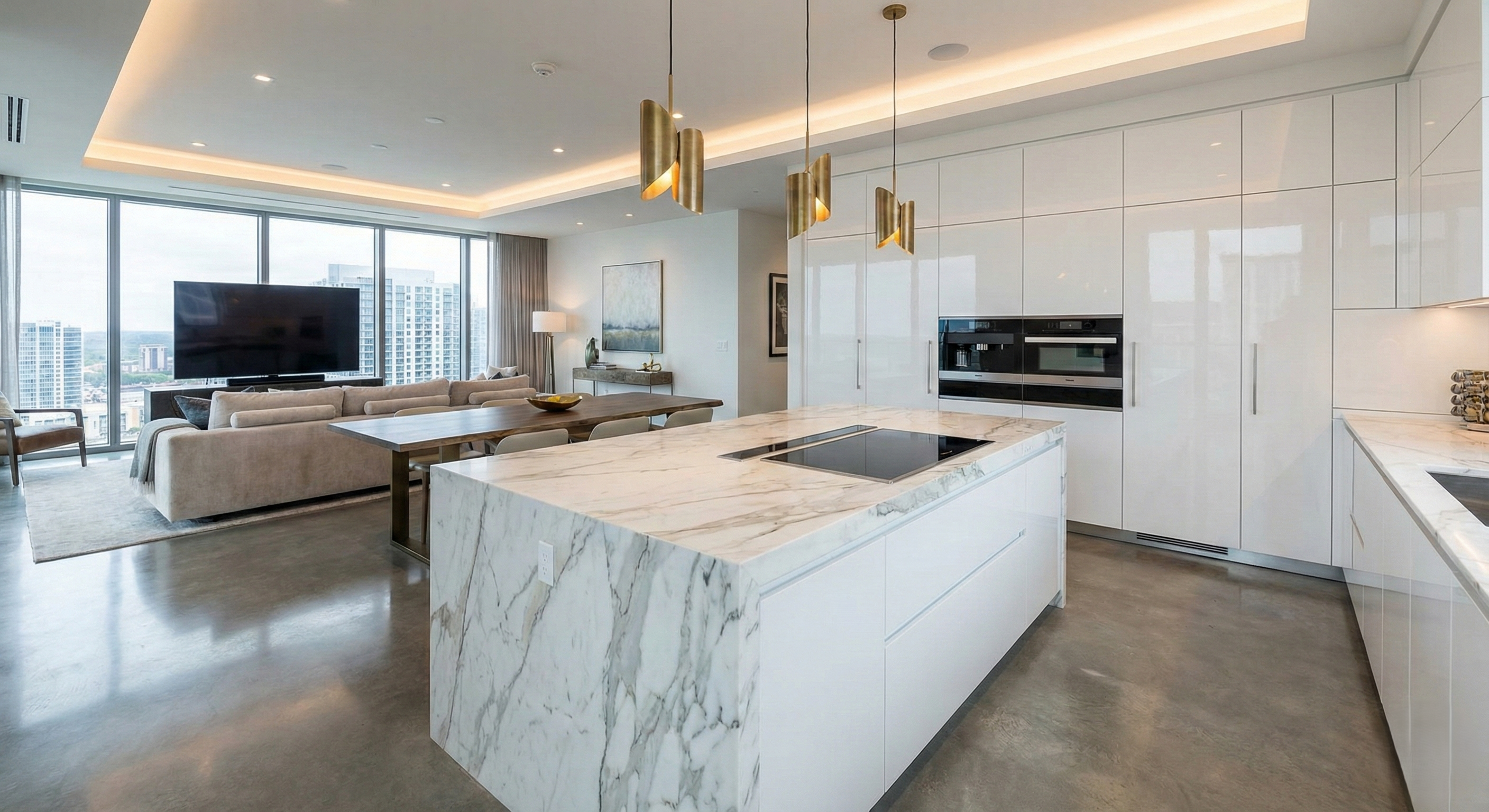 A luxurious island kitchen with marble countertops and a stunning view, representing premium modern living.
